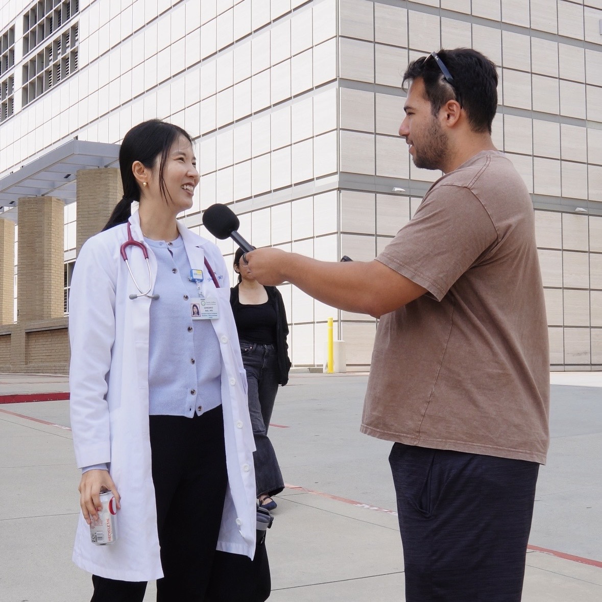 London interviewing a doctor on a hospital campus
