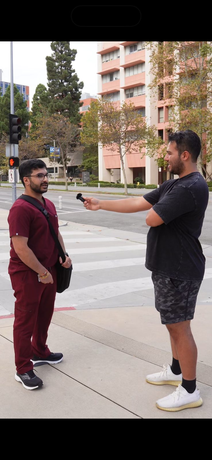 London interviewing a doctor in scrubs